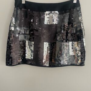 Express Sequins Miniskirt Y2K
Black/Silver Sz2. New without tag. Holiday Party